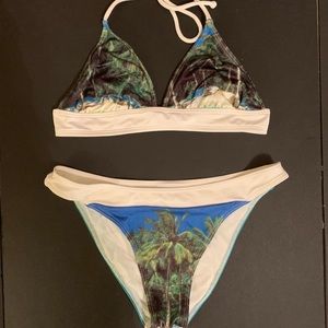 Women’s 3 Piece Aaron Chang Bathing suit in Medium.